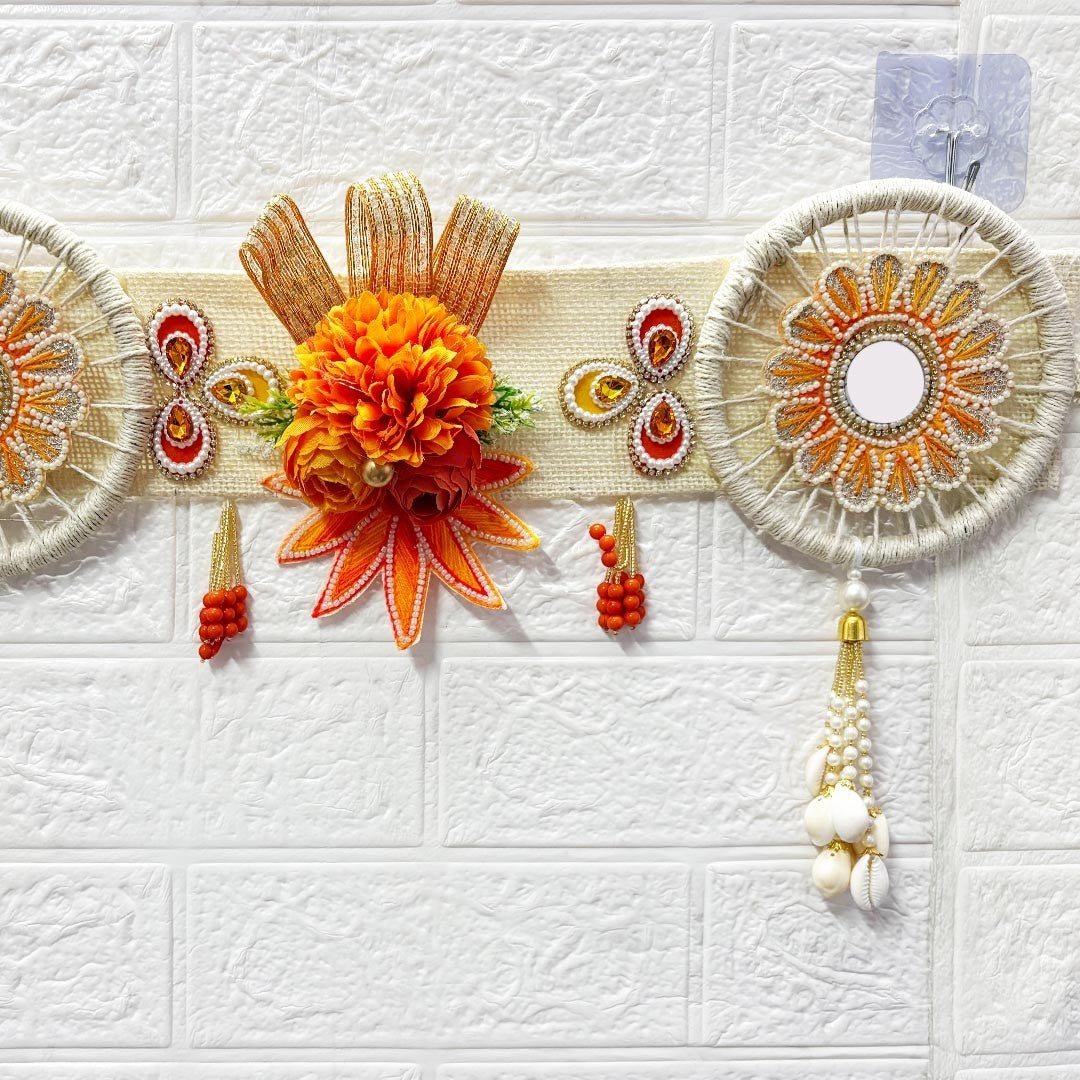 Adikala orange floral bandanwar toran door hanging with intricate beadwork and shell tassels. 40 inch length for festive home and mandir decoration.