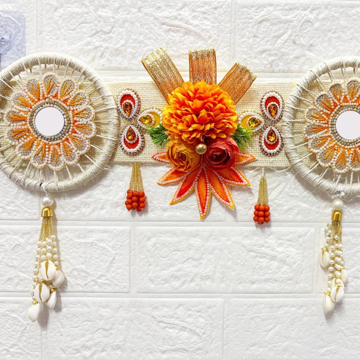 Adikala orange floral toran door hanging with beaded details, mirrors, and shell tassels. 40 inches.